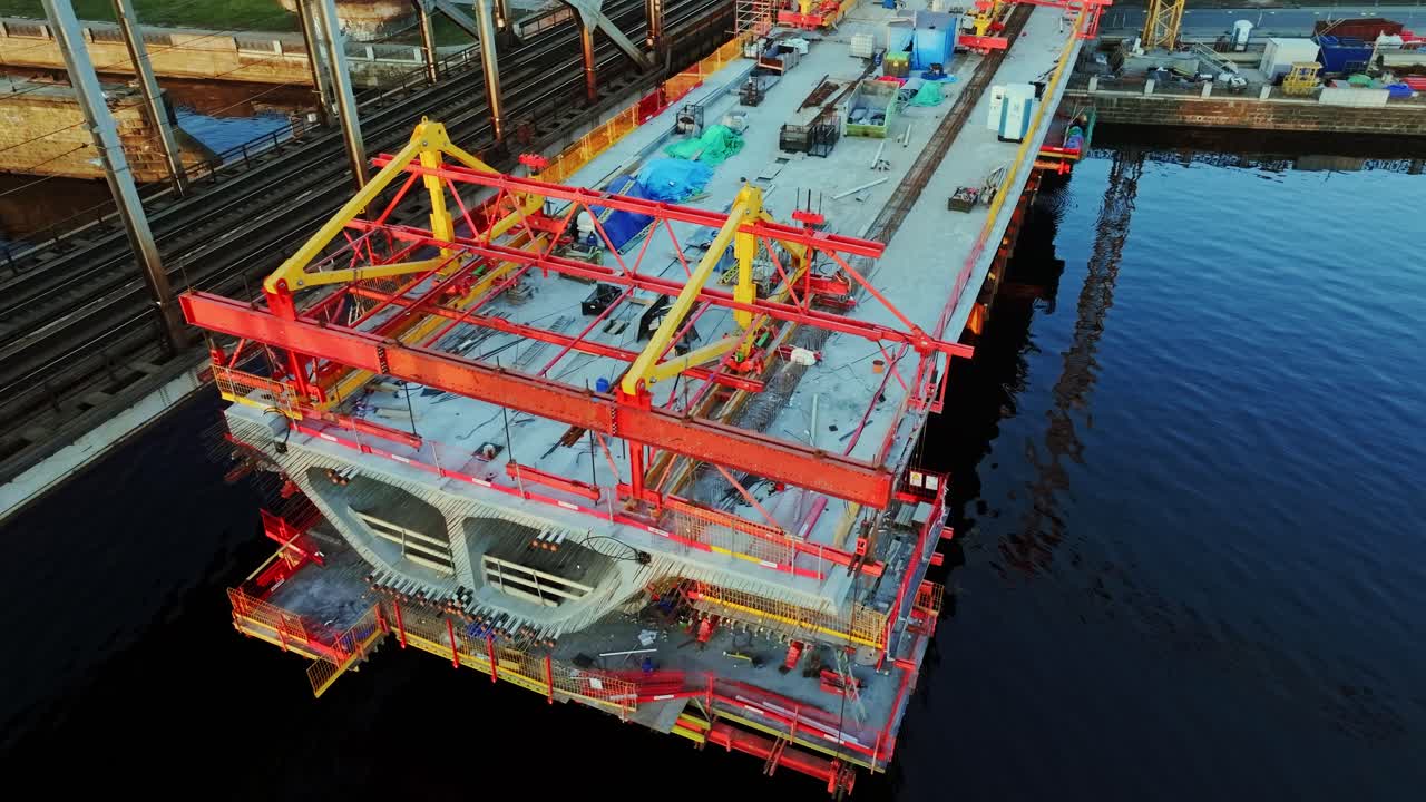 Rail Baltica bridge construction progresses over Daugava, modern engineering