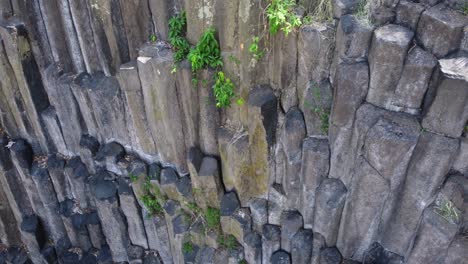 hexagonal basalt rock column formation, shifting aerial perspective