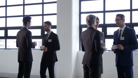 business people drinking coffee