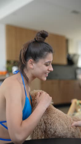 woman, child, and dog interacting