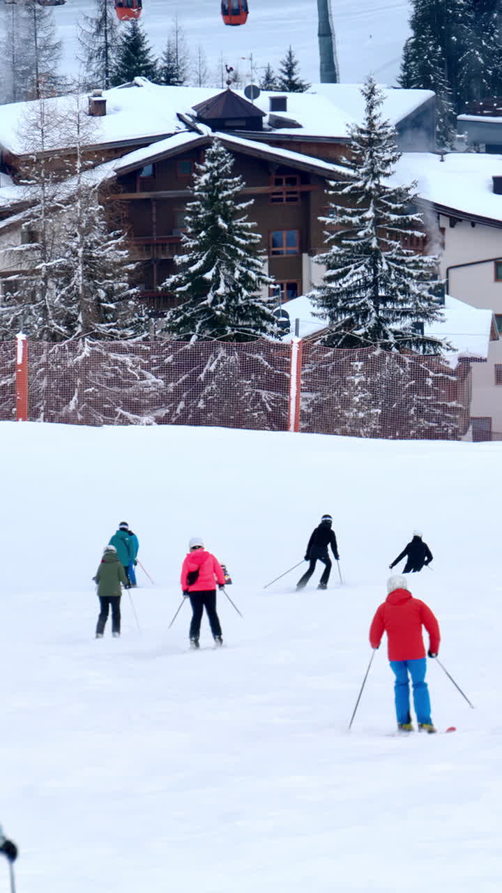 Multiple people skiing on the mountains at a ski resort in the Dolomites, Italy. Vertical
