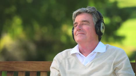 Mature-man-listening-to-music-