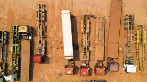 Vertical-aerial-shot-revealing-lorries-at-customs-in-the-Boten-Special-Economic-Zone,-Laos