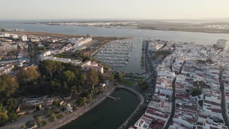 aerial rotation ayamonte city and marina landscape with portugal as background