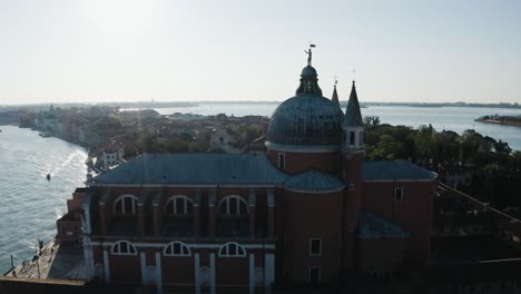 aerial view of chiesa del santissimo redentore on a bright sunny day in venice, italy