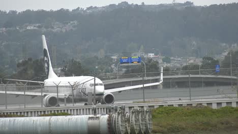 airplane prepares for departure on runway