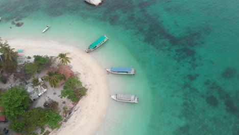 Top-down-view-of-tropical-beach-at-Belitung-Indonesia,-aerial