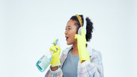 Studio,-headphones-and-woman-dance-while-cleaning