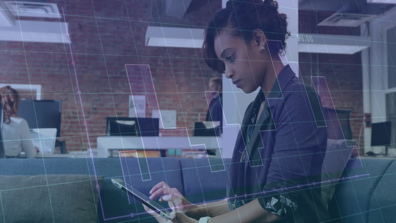 Animation of graph and grid pattern over biracial woman scrolling on digital tablet in office