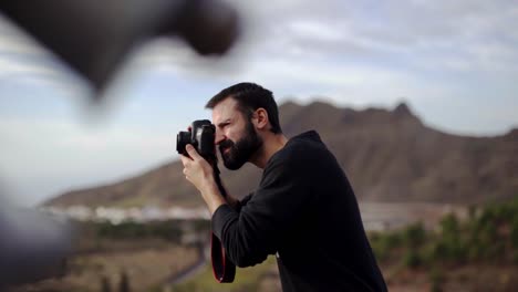 Bearded-photographer-clicking-landscapes-with-prime-lens-at-Teide-national-park