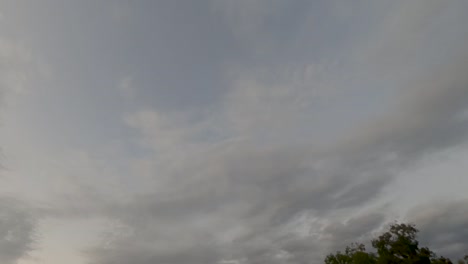 night lapse of clouds and stars during a rainy night