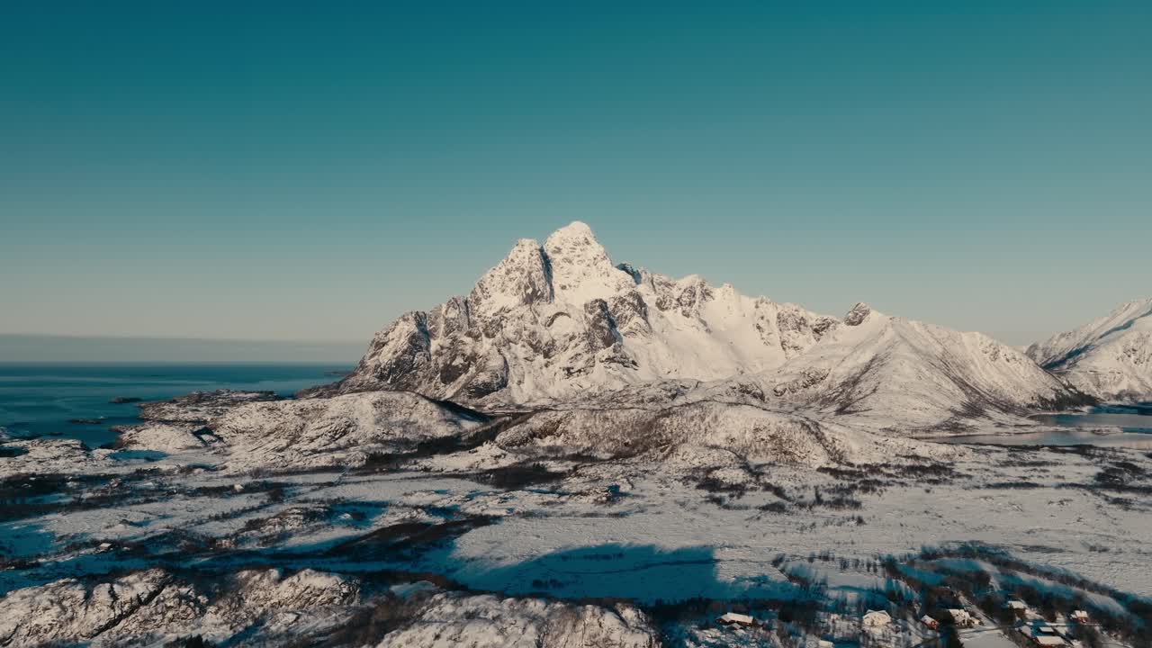 Scenic Snow Rocky Mountain Near Skarungen Campsite In Lofoten Islands, Norway. Aerial Shot