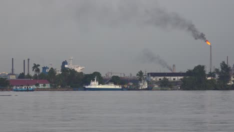 Ferry-boats-pass-in-the-harbor-in-havana-Cub-with-an-industrial-scene-background