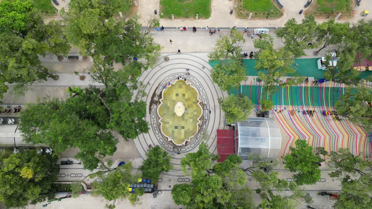 Descending over the fountain at Sao Pedro de Alcantara view point in Lisbon,Portugal