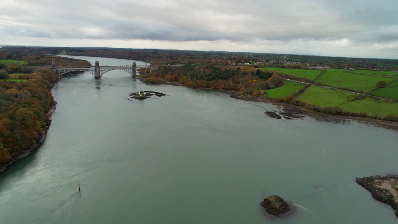 Impress aerial shot of the suspension bridge that crosses the Menai Strait between the island of Anglesey and the mainland of Wales