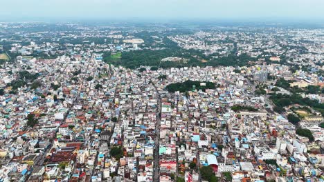 expansive aerial view of a densely populated residential area in mysuru, india, highlighting compact housing, vibrant neighborhoods, and the intricate layout of urban life in a bustling indian city.