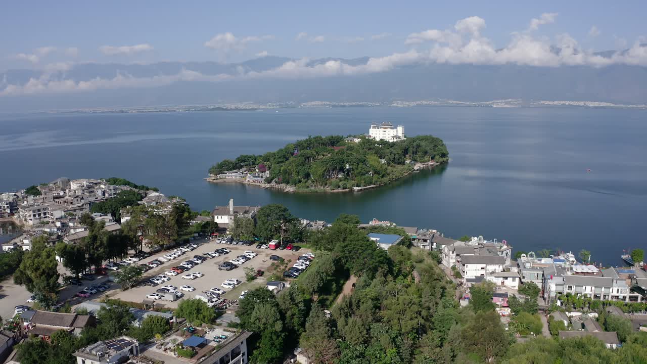 Village and lake in Shuanglang, Yunnan, China.