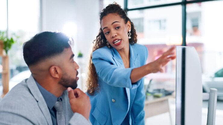 Computer, training and woman helping employee