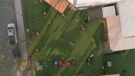 slowly descending aerial footage top down of a dog park in downtown chattanooga, tn