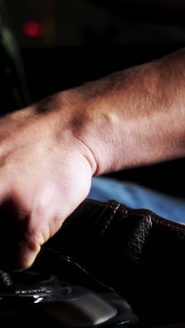 person working on a car interior