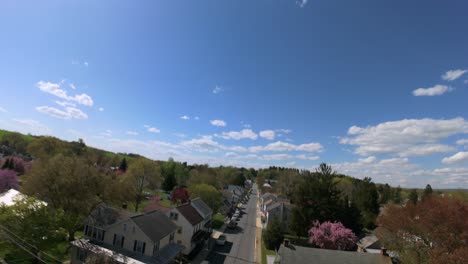 american town street during bright spring day