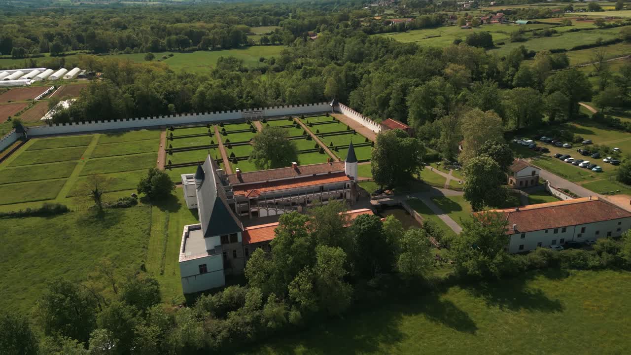 aerial shot around the bastie d'urfe castle in Forez plain, loire departement, auvergne rhone alpes region, france