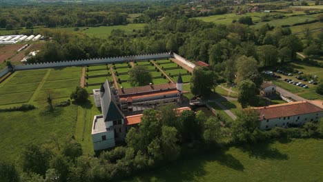 aerial shot around the bastie d'urfe castle in forez plain, loire departement, auvergne rhone alpes region, france