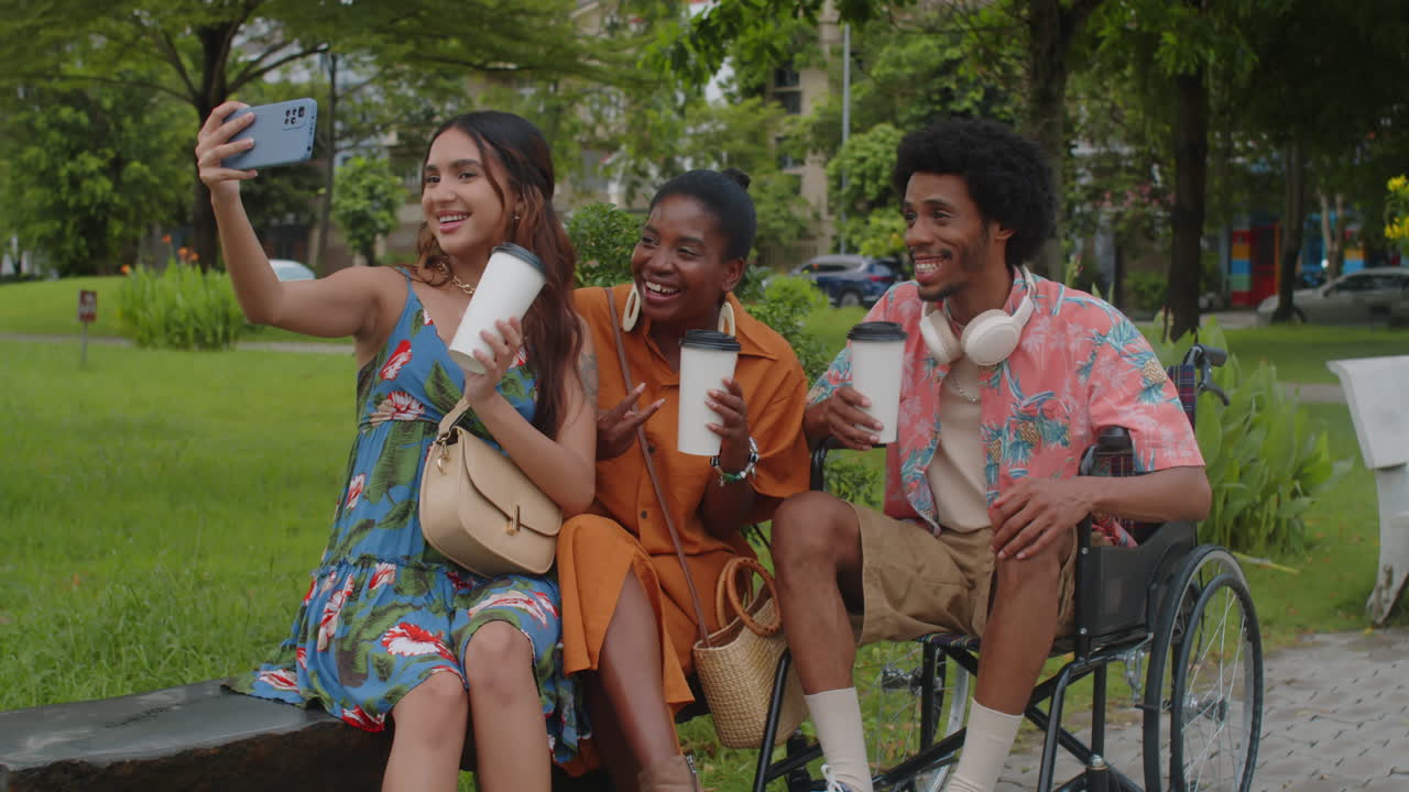 Diverse Friends Taking Group Selfie in Park