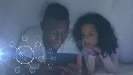 animation of smiling african american father and daughter using tablet, over globe spinning