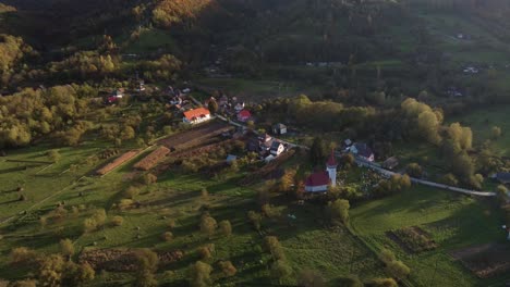 Scenic-sunset-view-of-traditional-village-in-Transylvania,-Romania,-Eastern-Europe