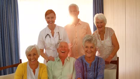 group of happy senior people and doctor