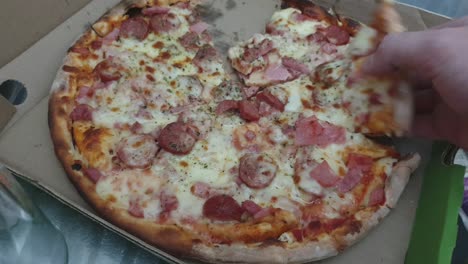 Pizza-perfect,-extra-melting-cheddar-cheese,-extra-salami-and-pepperoni-toppings-served-hot,-enjoy-right-out-of-the-box