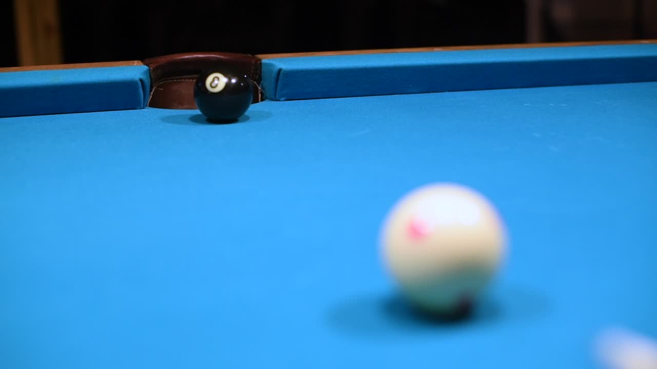 Draw shot at the eight ball in american pool