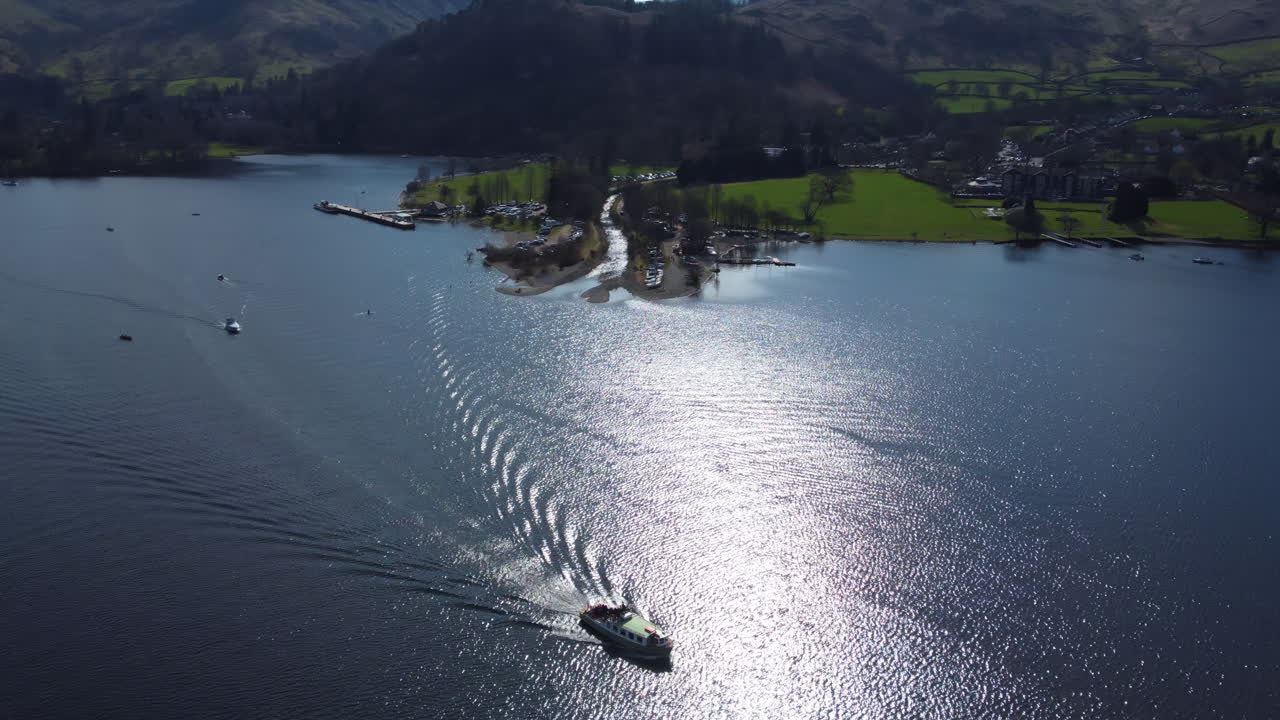 Aerial drone view of boat and nature in Lake District United Kingdom