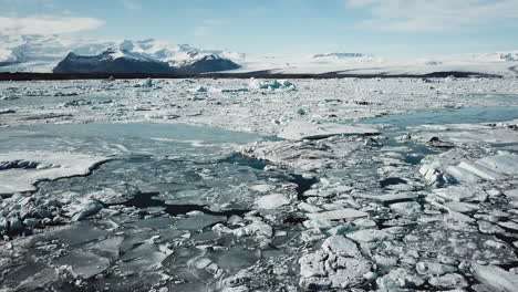 Beautiful-Aerial-View-of-Glacial-Lagoon-in-Iceland-with-Blue-Sky