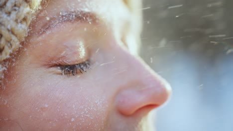 woman's face covered in snow