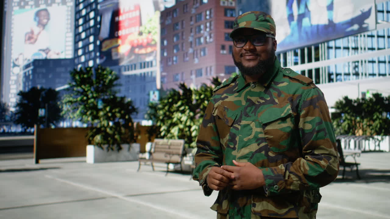 Adult male military service person walks through downtown center,