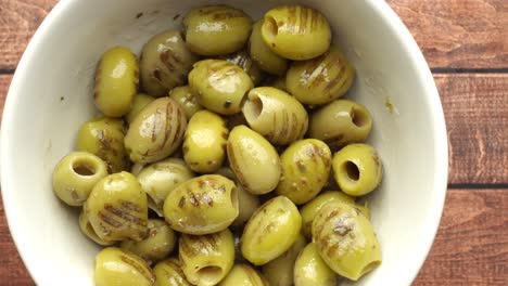 green olives in a bowl