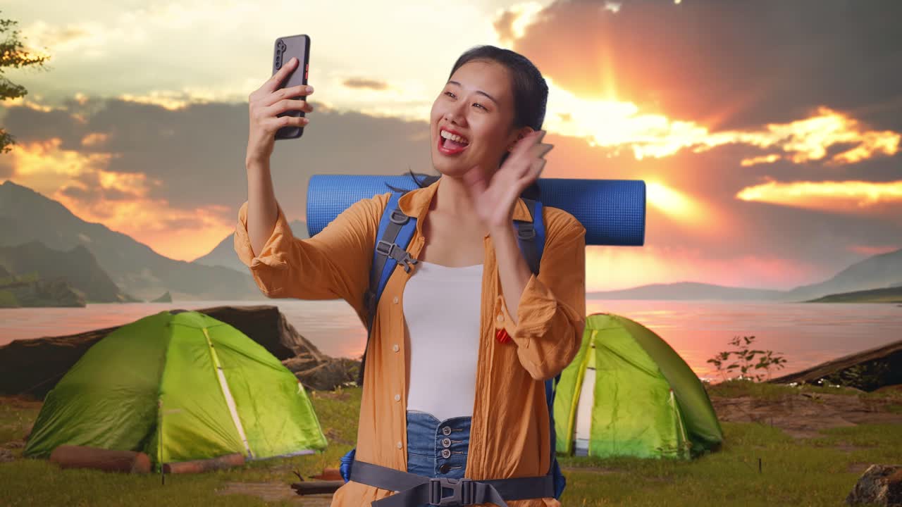 Woman Taking Selfie at Sunset Campground