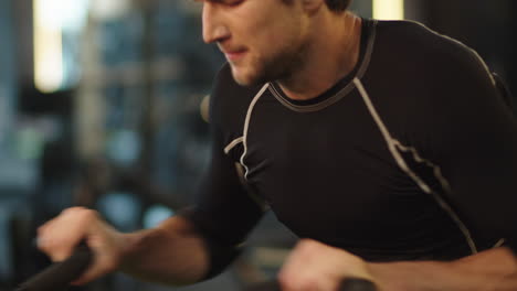 fit man doing cardio at gym