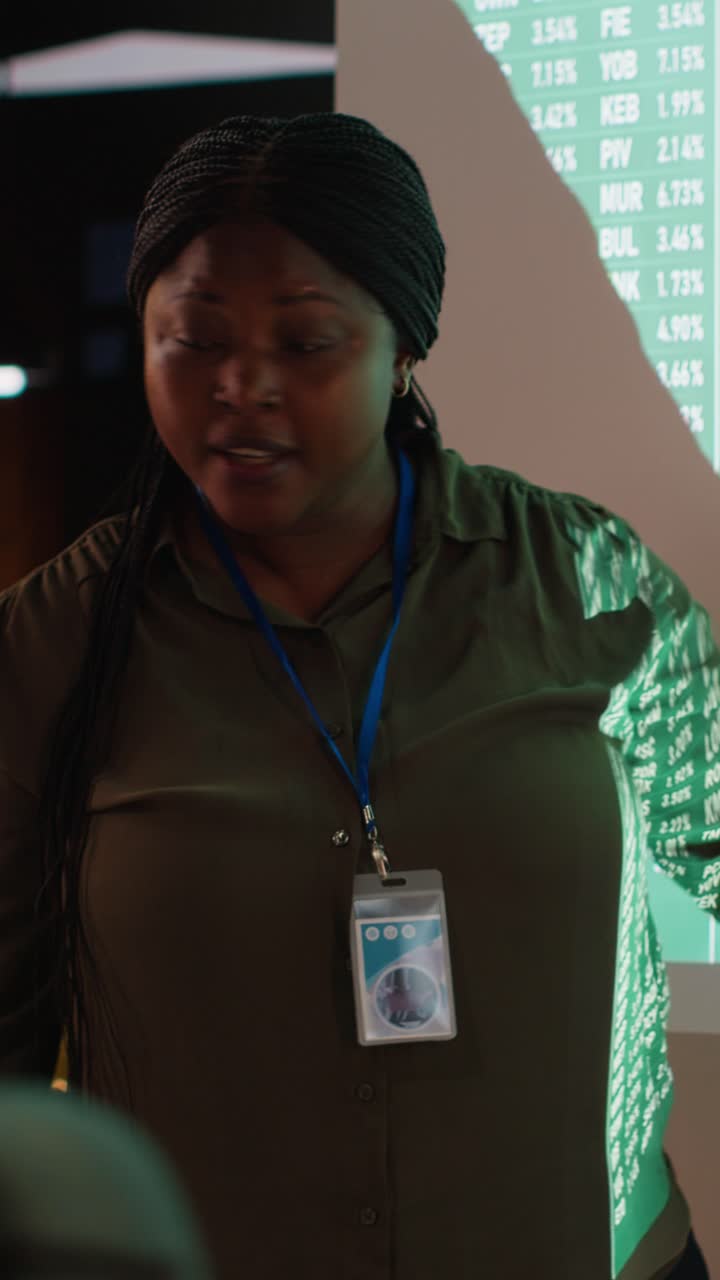 Vertical Video Diverse executive team analyzing infographics to evaluate supply and demand