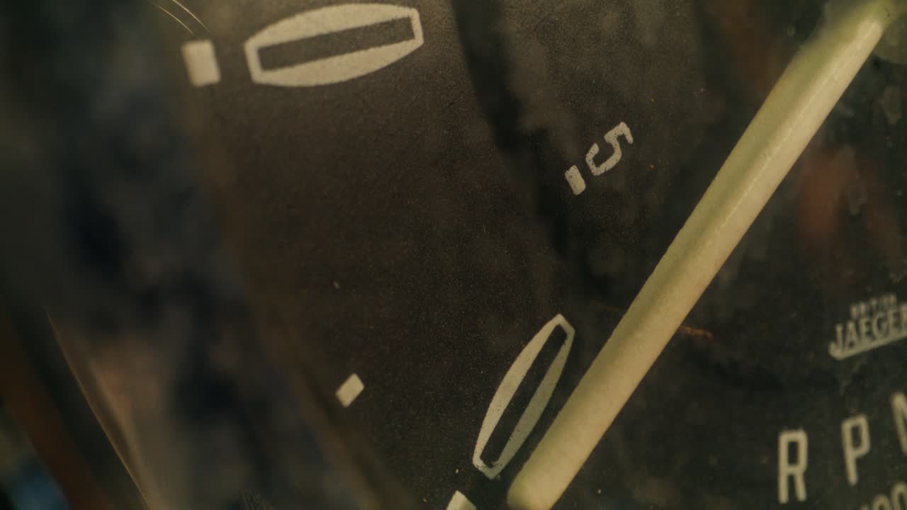 Close-up of a car tachometer