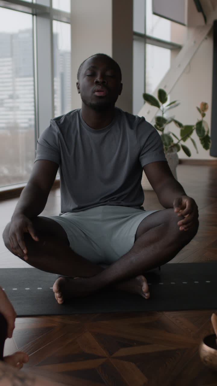 Man Practicing Yoga or Meditation