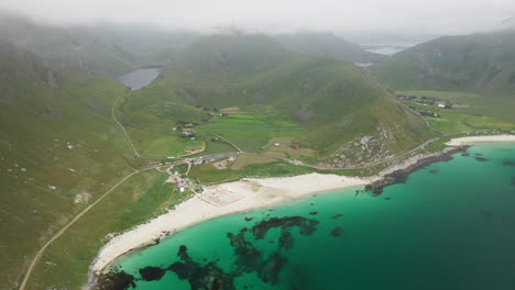 wide drone footage of vik beach and hauklandstranda norway, coastline aerial with turquoise blue water