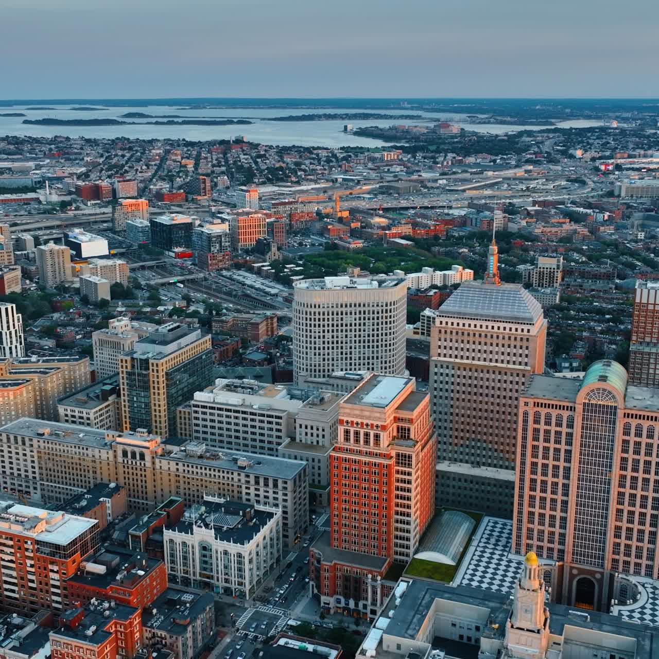 View of 200 Clarendon Street, previously John Hancock Tower in the Back Bay neighborhood of Boston. Top view. City scenery after sunset