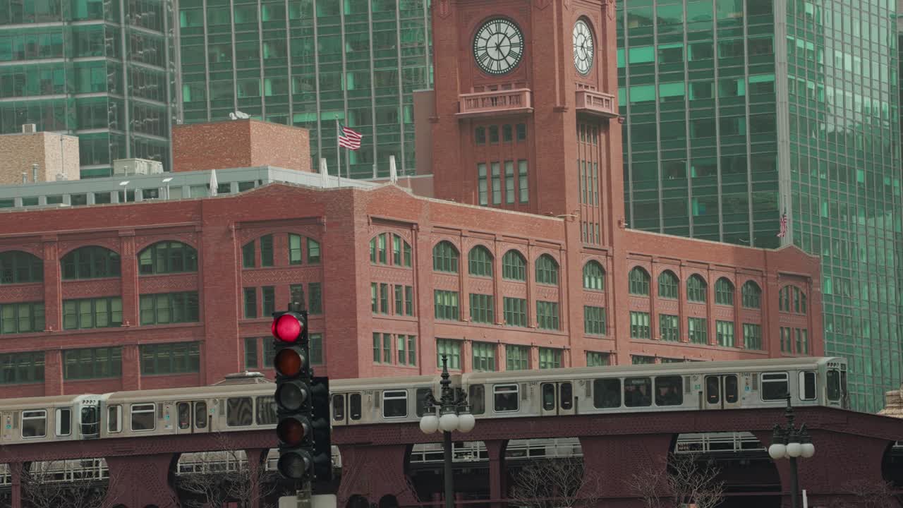 Chicago Metra Train Passing Through Downtown Loop District Between Modern and Historic Architecture