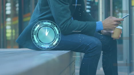 animation of clock and data processing over midsection of caucasian businessman using smartphone