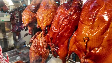 roasted ducks in a restaurant display
