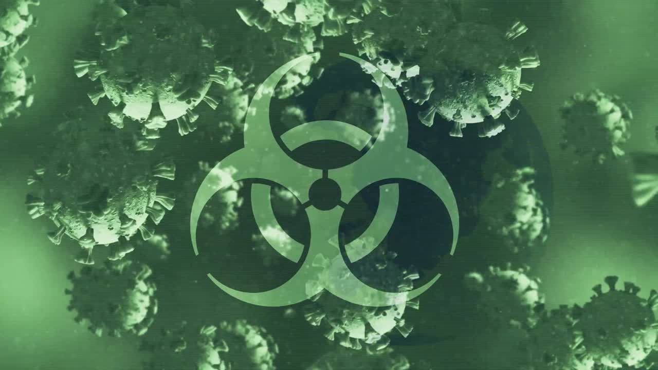 анимация падающих клеток ковид-19 над предупреждающим знаком