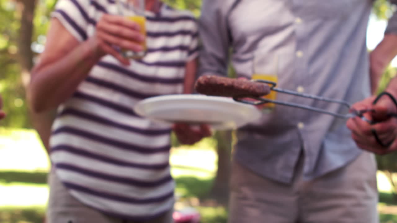 Happy family having a barbecue